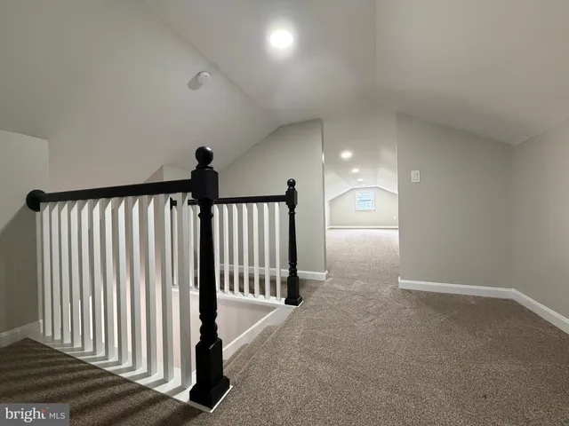 a view of hallway with stairs