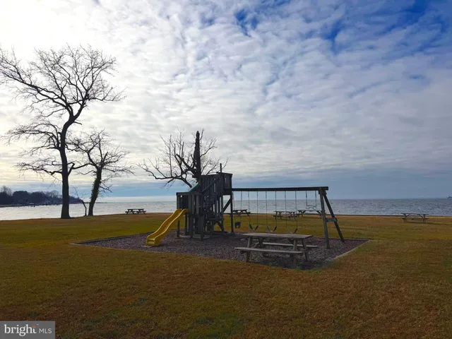 a view of a park with swings