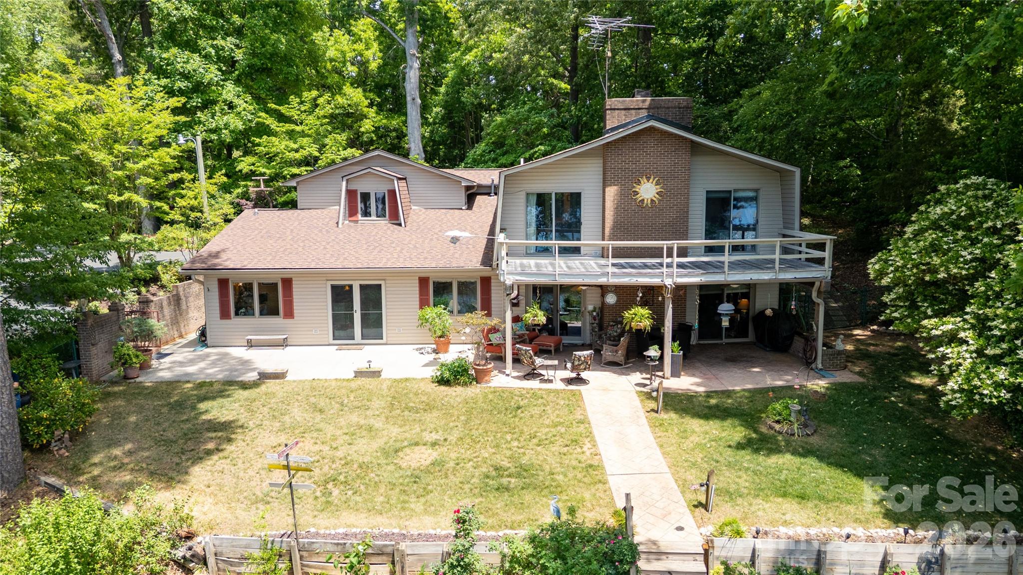 a front view of a house with swimming pool