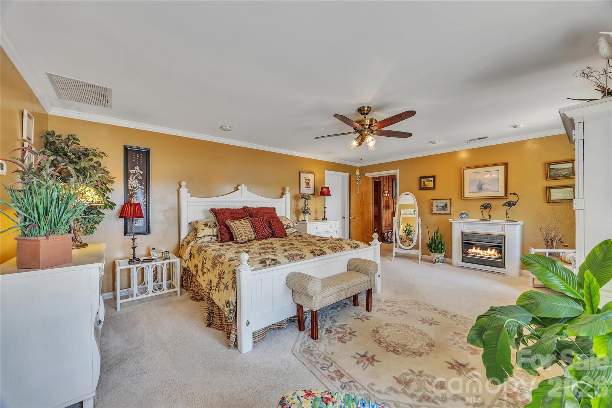 630 Mainsail Road Salisbury, NC 28146 - Photo 14 of 44 a bed room with a bed furniture and a ceiling fan