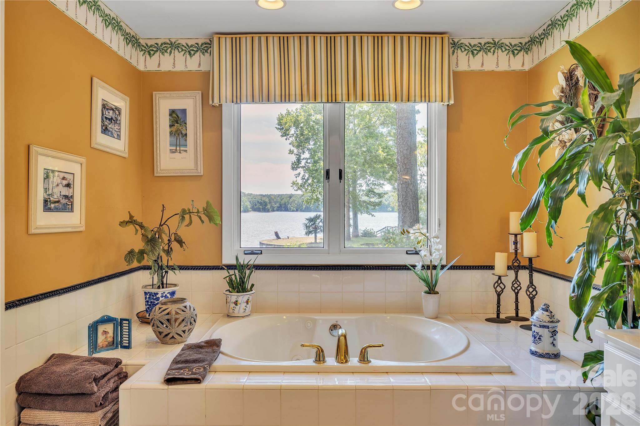 630 Mainsail Road Salisbury, NC 28146 - Photo 19 of 44 a bathroom with a tub sink and mirror