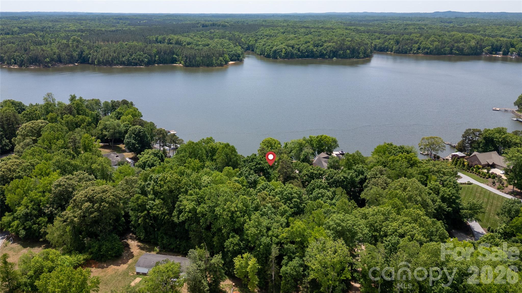 630 Mainsail Road Salisbury, NC 28146 - Photo 2 of 44 an aerial view of a houses with lake view