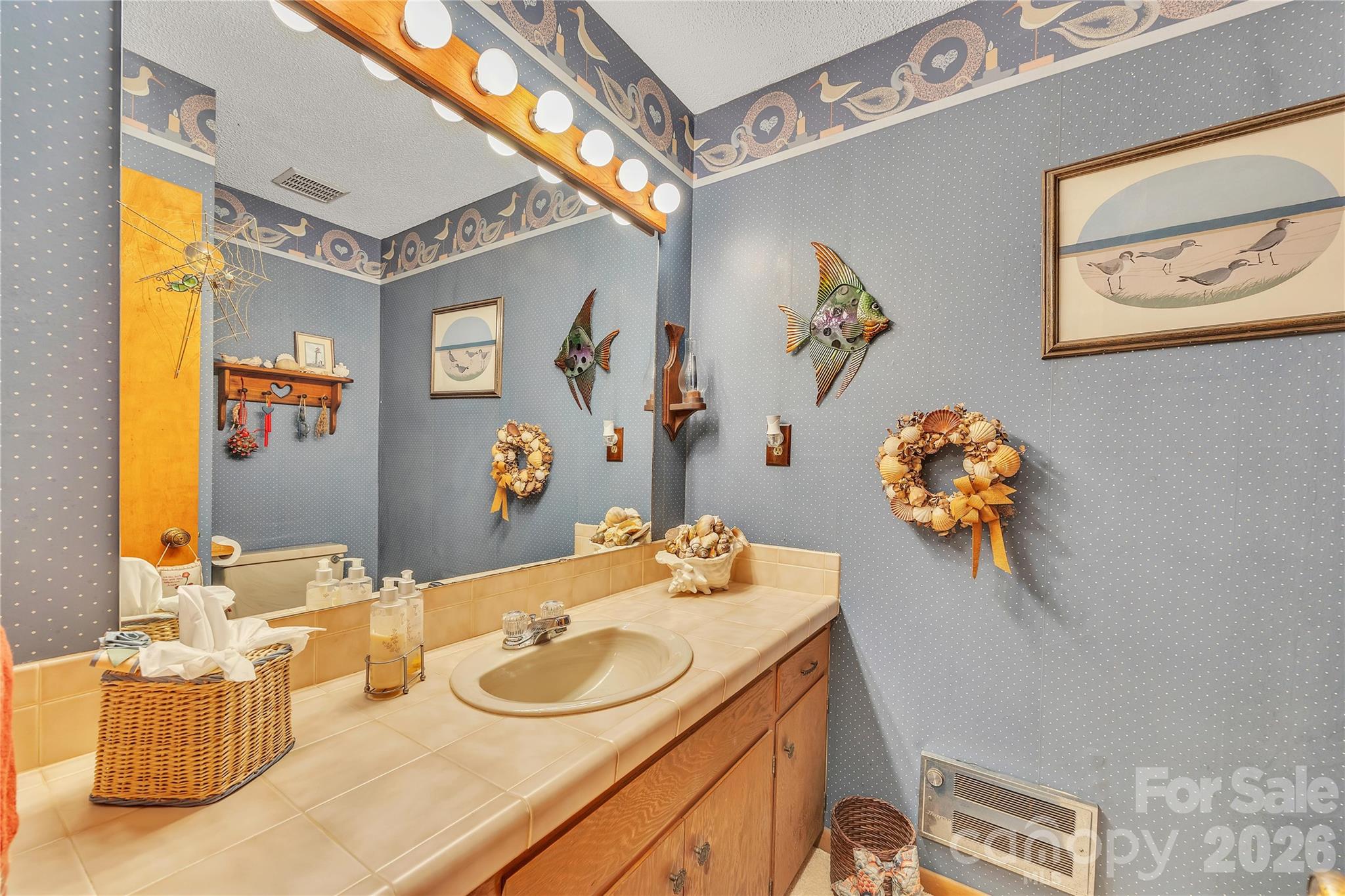 630 Mainsail Road Salisbury, NC 28146 - Photo 21 of 44 a bathroom with a sink mirror and vanity