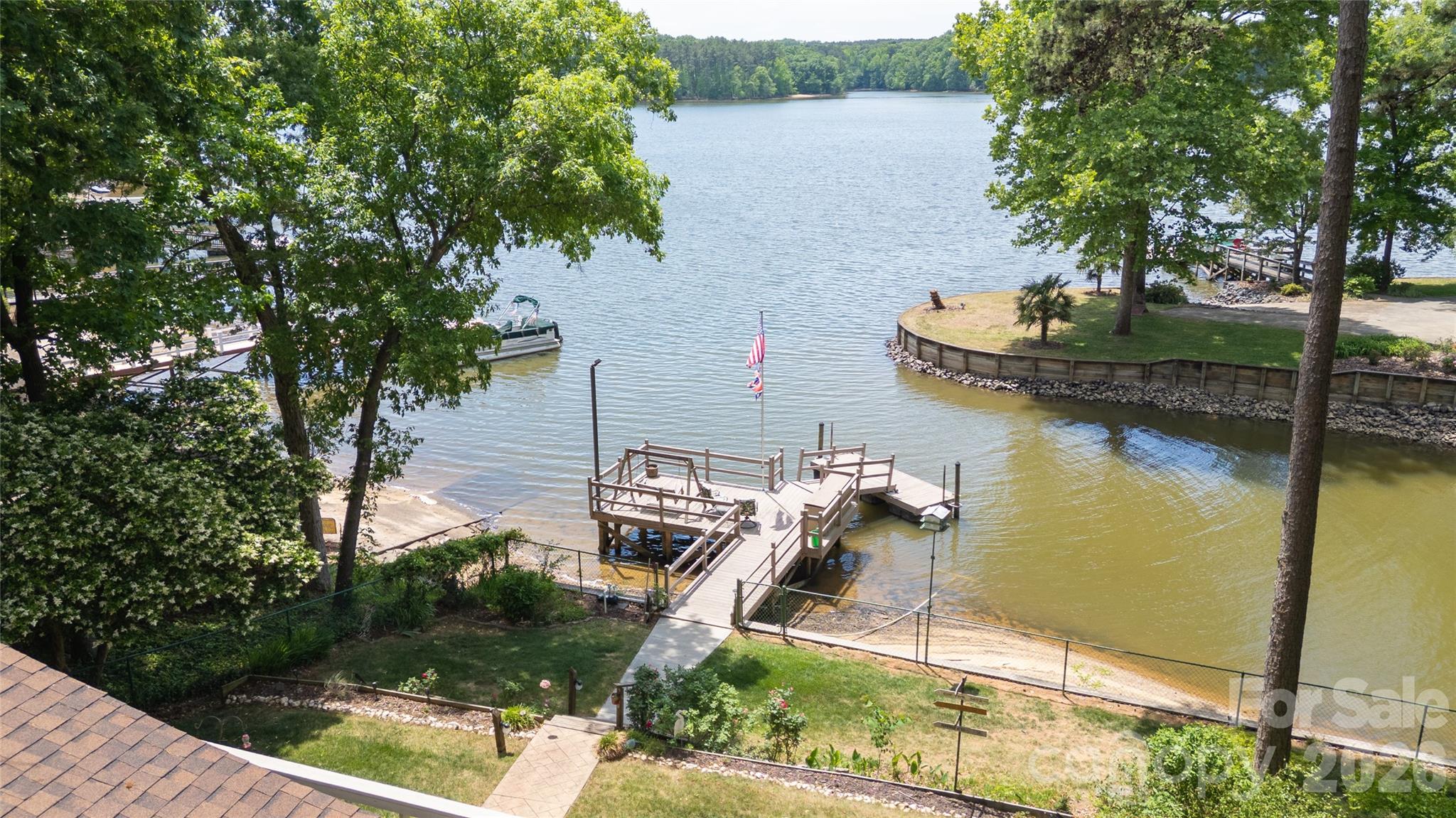 630 Mainsail Road Salisbury, NC 28146 - Photo 3 of 44 a view of a lake with sitting area