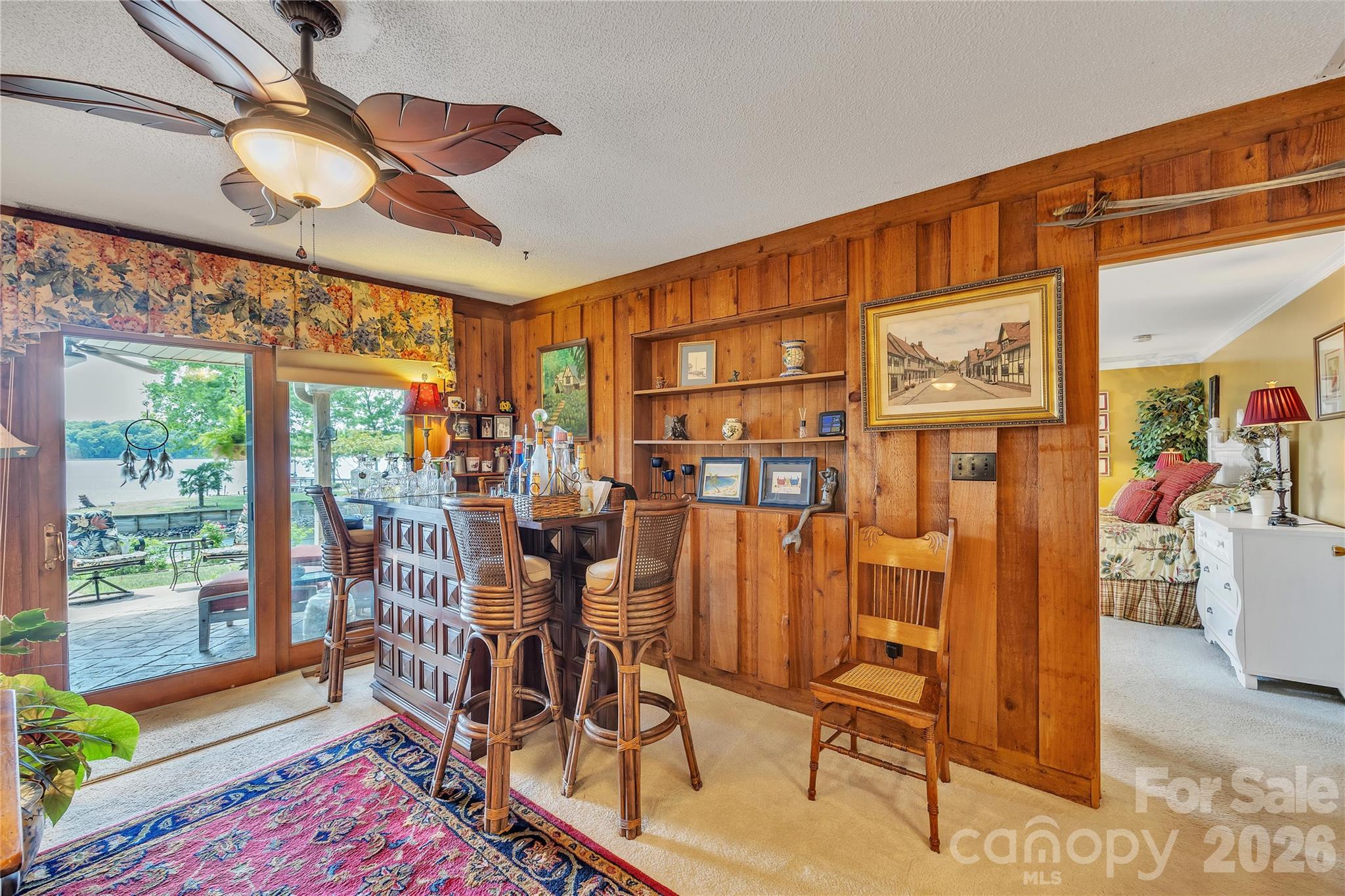 630 Mainsail Road Salisbury, NC 28146 - Photo 8 of 44 a view of a dining room with furniture wooden floor and chandelier