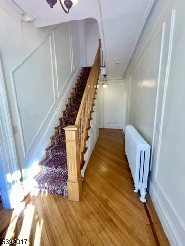 an empty room with a empty space and windows