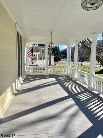 a view of a house with wooden stairs