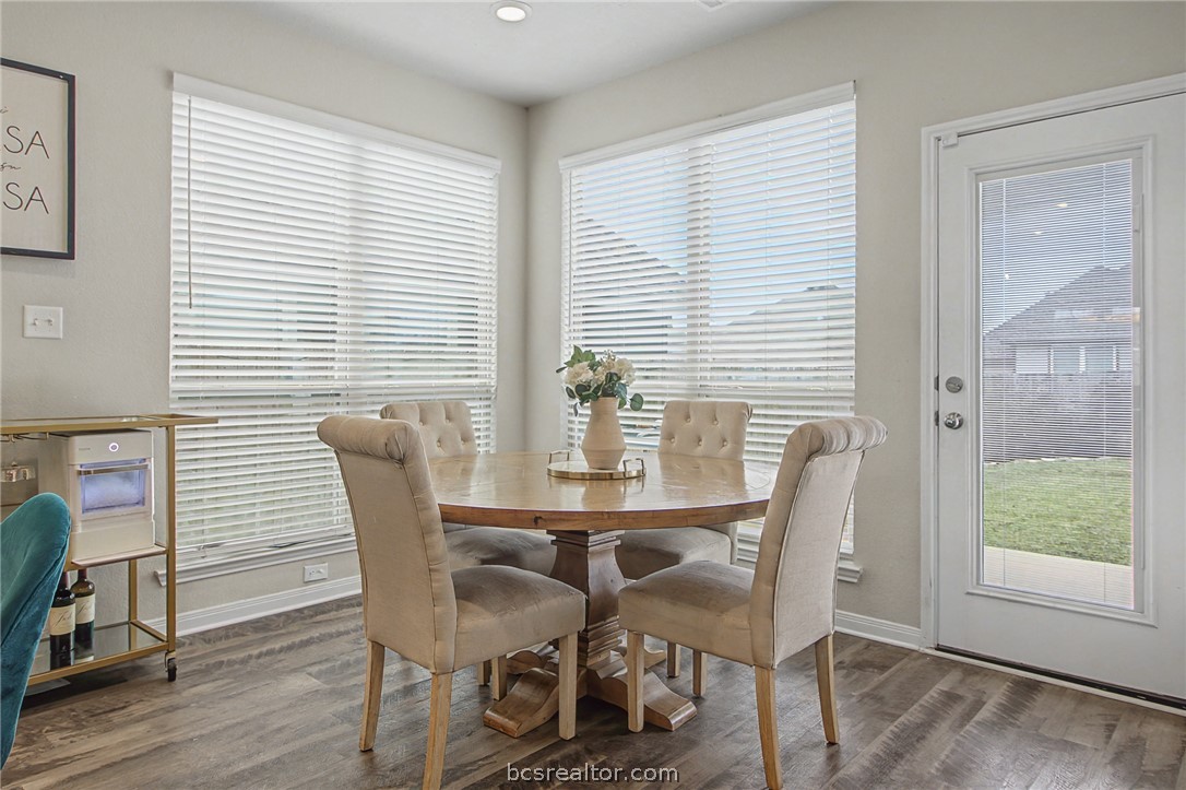 2111 Markley Drive Bryan, TX 77807 - Photo 12 of 30 a view of a dining room with furniture and wooden floor