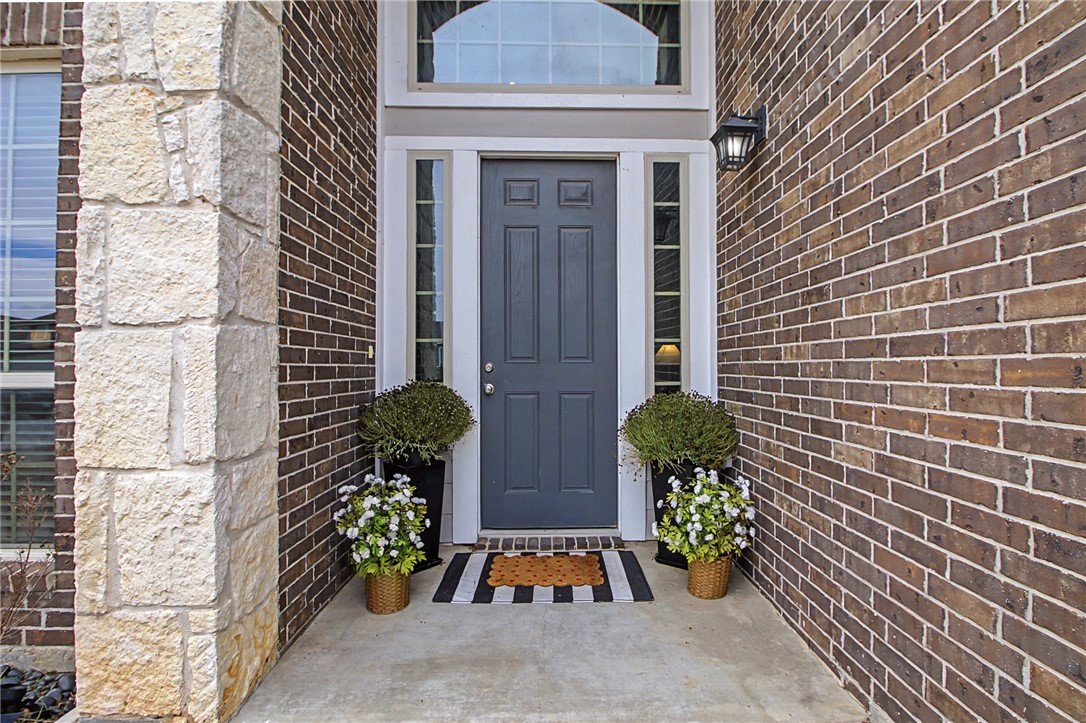 2111 Markley Drive Bryan, TX 77807 - Photo 3 of 30 a front view of a house with outdoor space