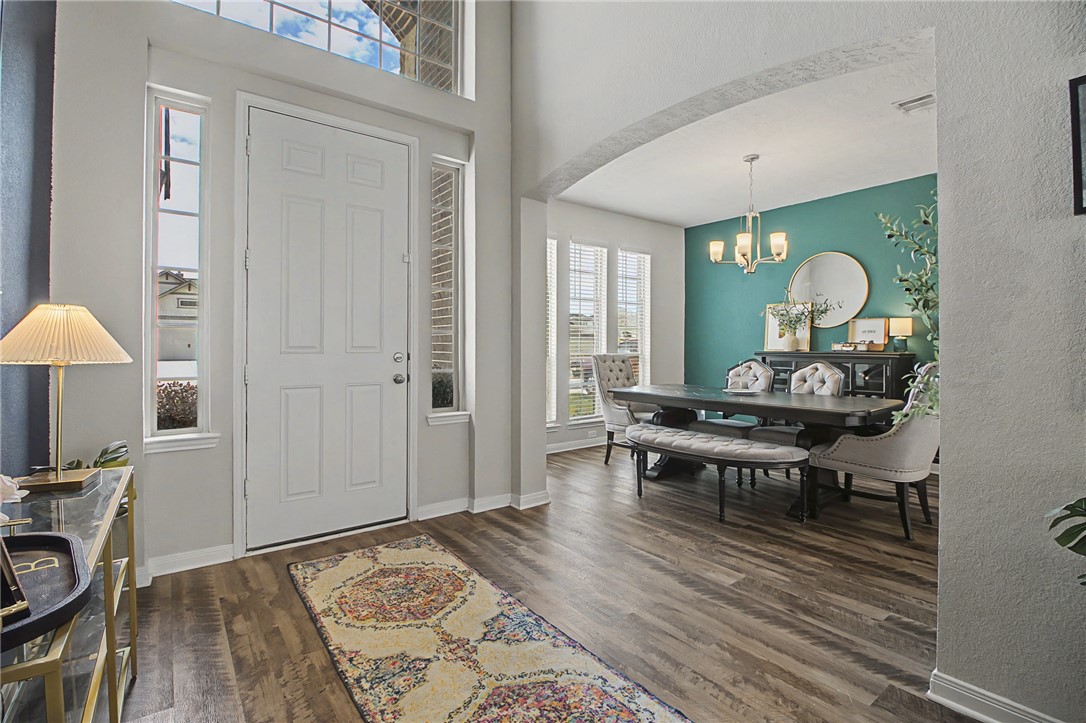 2111 Markley Drive Bryan, TX 77807 - Photo 5 of 30 a view of a dining room with furniture and wooden floor