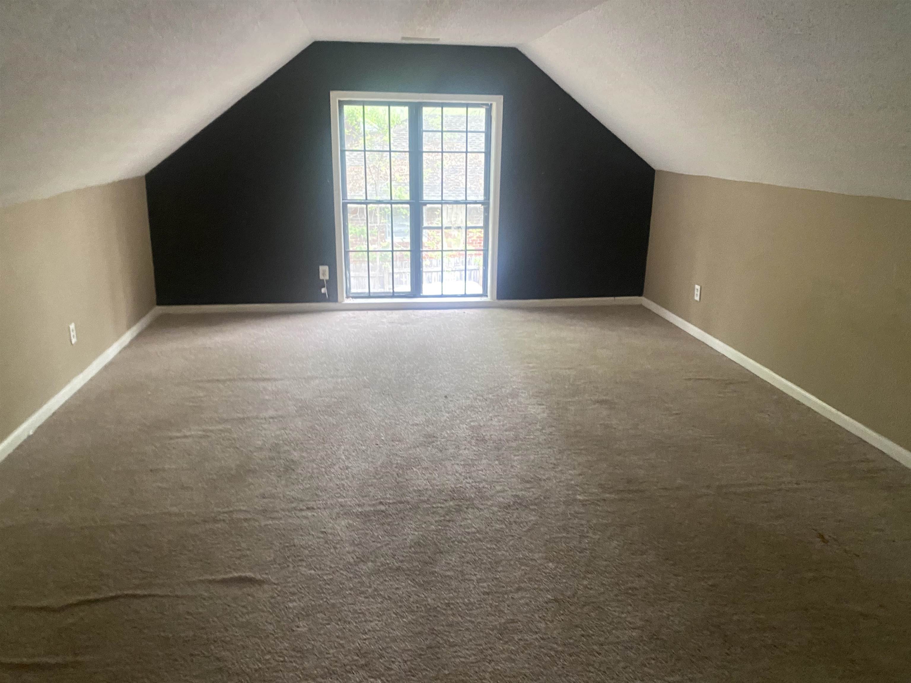 3051 Knight Road Memphis, TN 38118 - Photo 3 of 18 a view of an empty room with a window