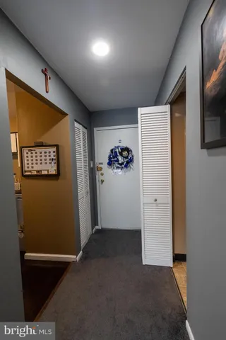 a view of front door with livingroom