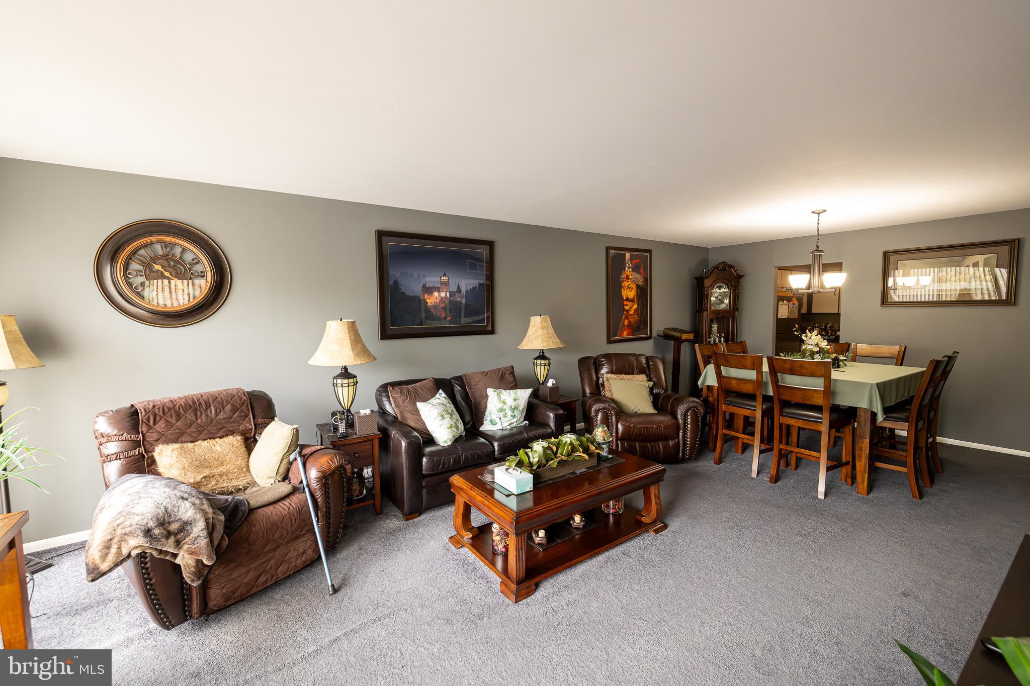1680 Huntingdon Pike, Unit 210 Huntingdon Valley, PA 19006 - Photo 13 of 36 a living room with furniture and a window