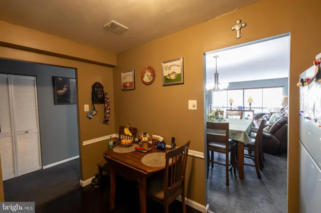 a bathroom with a sink toilet vanity and shower