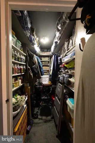 a view of a chairs and table in the balcony