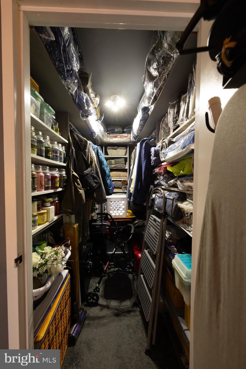 1680 Huntingdon Pike, Unit 210 Huntingdon Valley, PA 19006 - Photo 27 of 36 a view of walk in closet with clothes and shoes