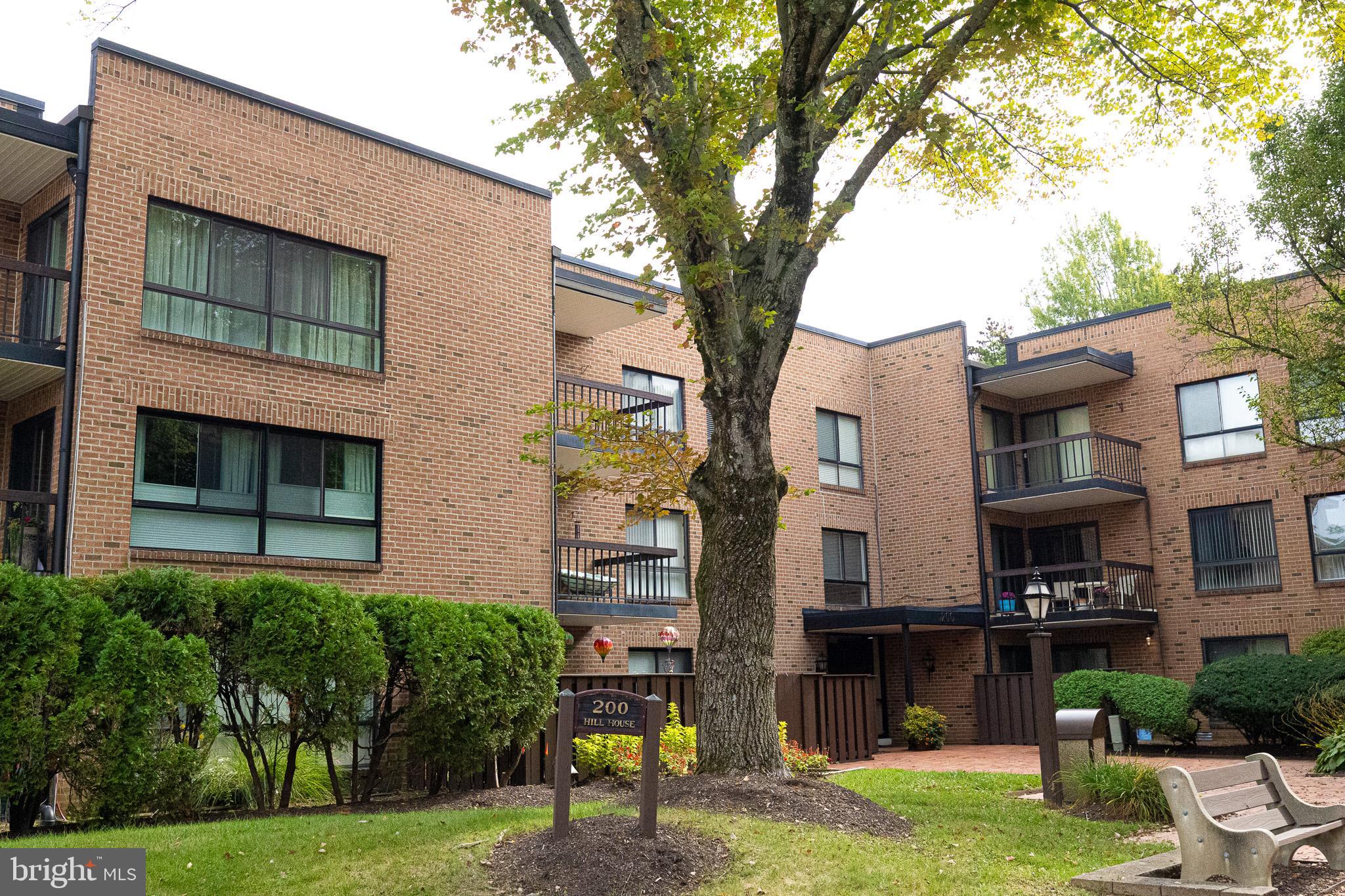 1680 Huntingdon Pike, Unit 210 Huntingdon Valley, PA 19006 - Photo 3 of 36 a front view of a building with garden