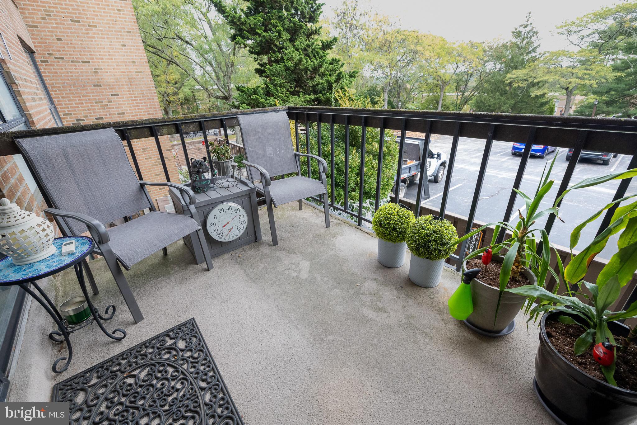 1680 Huntingdon Pike, Unit 210 Huntingdon Valley, PA 19006 - Photo 32 of 36 a view of a chairs and table in the balcony