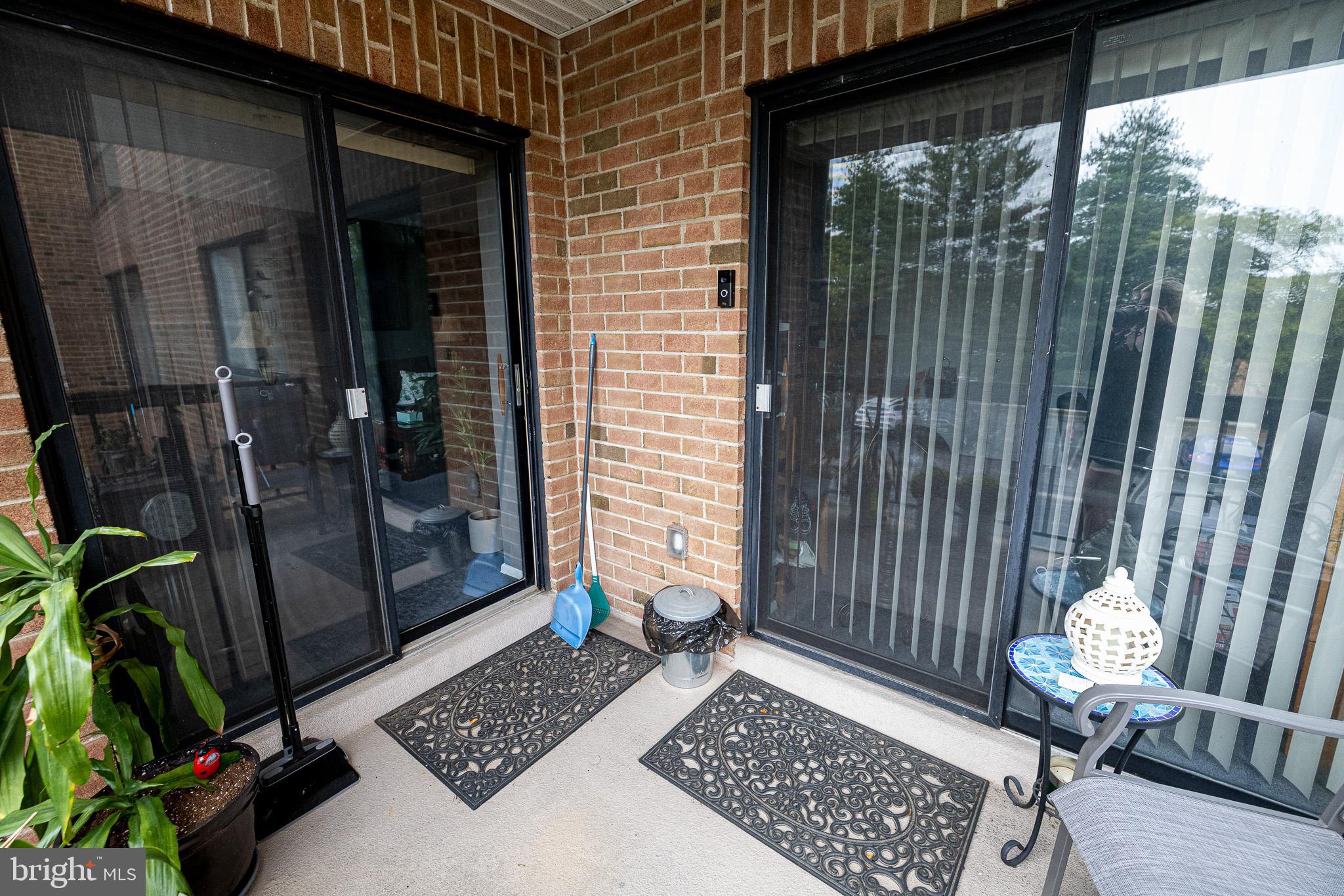 1680 Huntingdon Pike, Unit 210 Huntingdon Valley, PA 19006 - Photo 34 of 36 a view of a two chairs in the back yard of the house