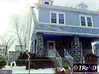 6 Englewood Road Upper Darby, PA 19082 - Photo 1 of 1 a front view of a building with street