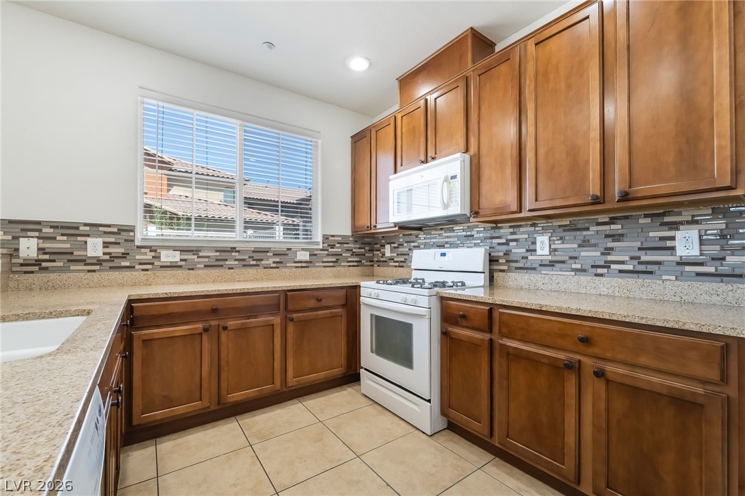 3175 Via Seranova Henderson, NV 89044 - Photo 13 of 45 This functional kitchen features ample cabinetry and a clean aesthetic.
