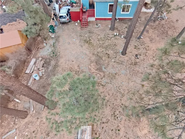 a view of outdoor space with playground and tree s