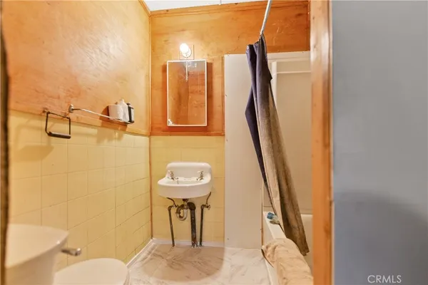 a view of a entryway door with furniture