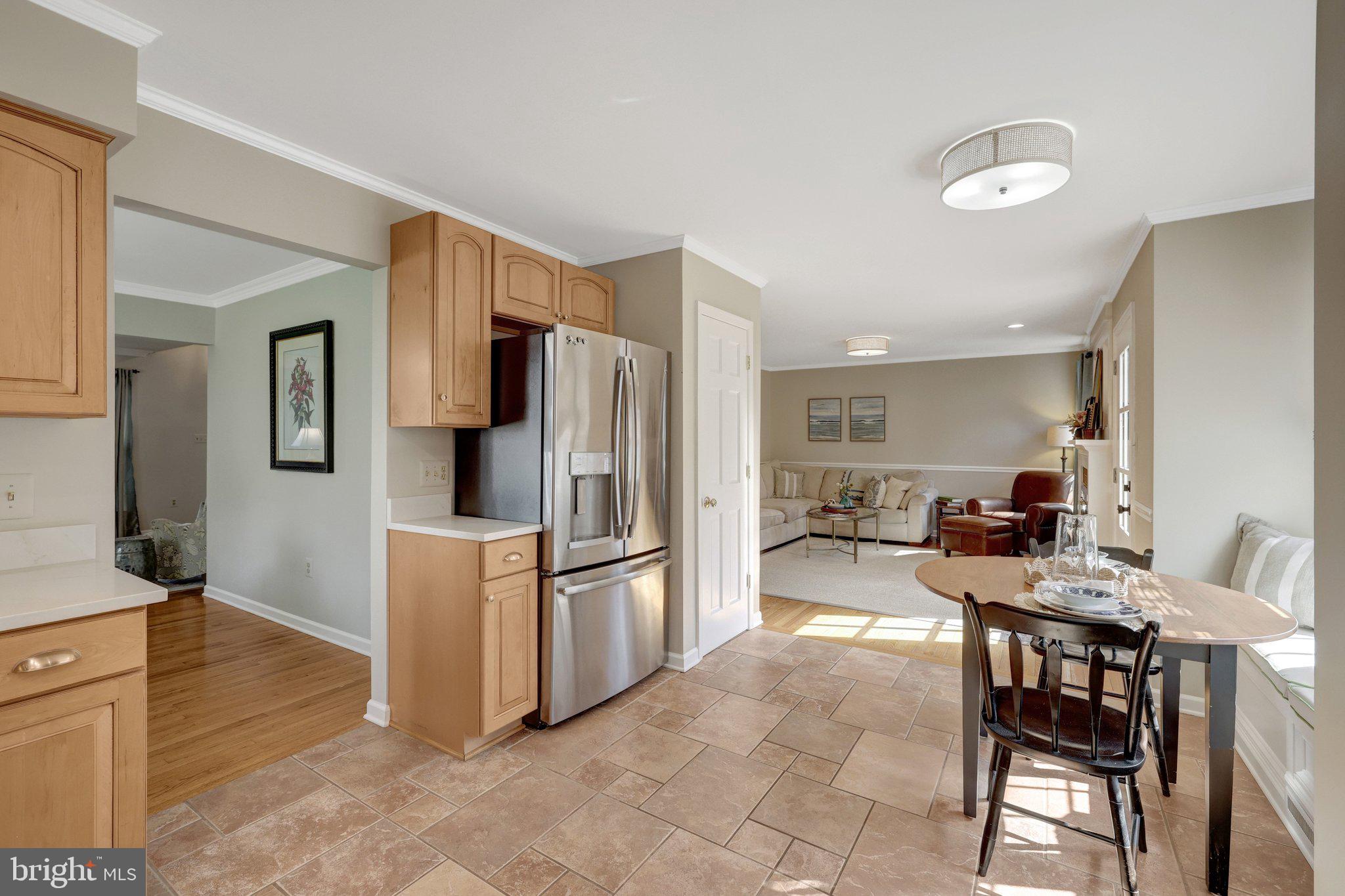 21039 Barcroft Way Sterling, VA 20164 - Photo 20 of 63 a kitchen with stainless steel appliances a refrigerator and a stove top oven