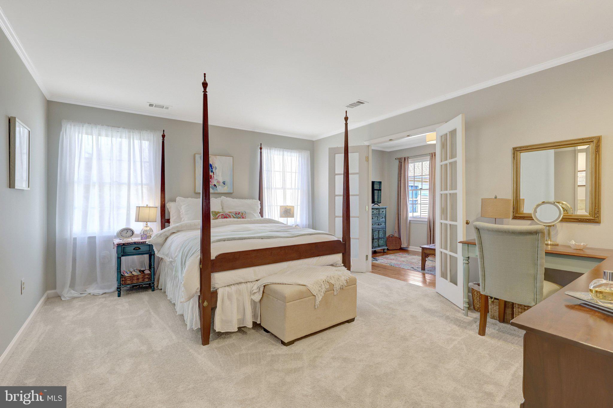 21039 Barcroft Way Sterling, VA 20164 - Photo 30 of 63 a living room with furniture and a large window