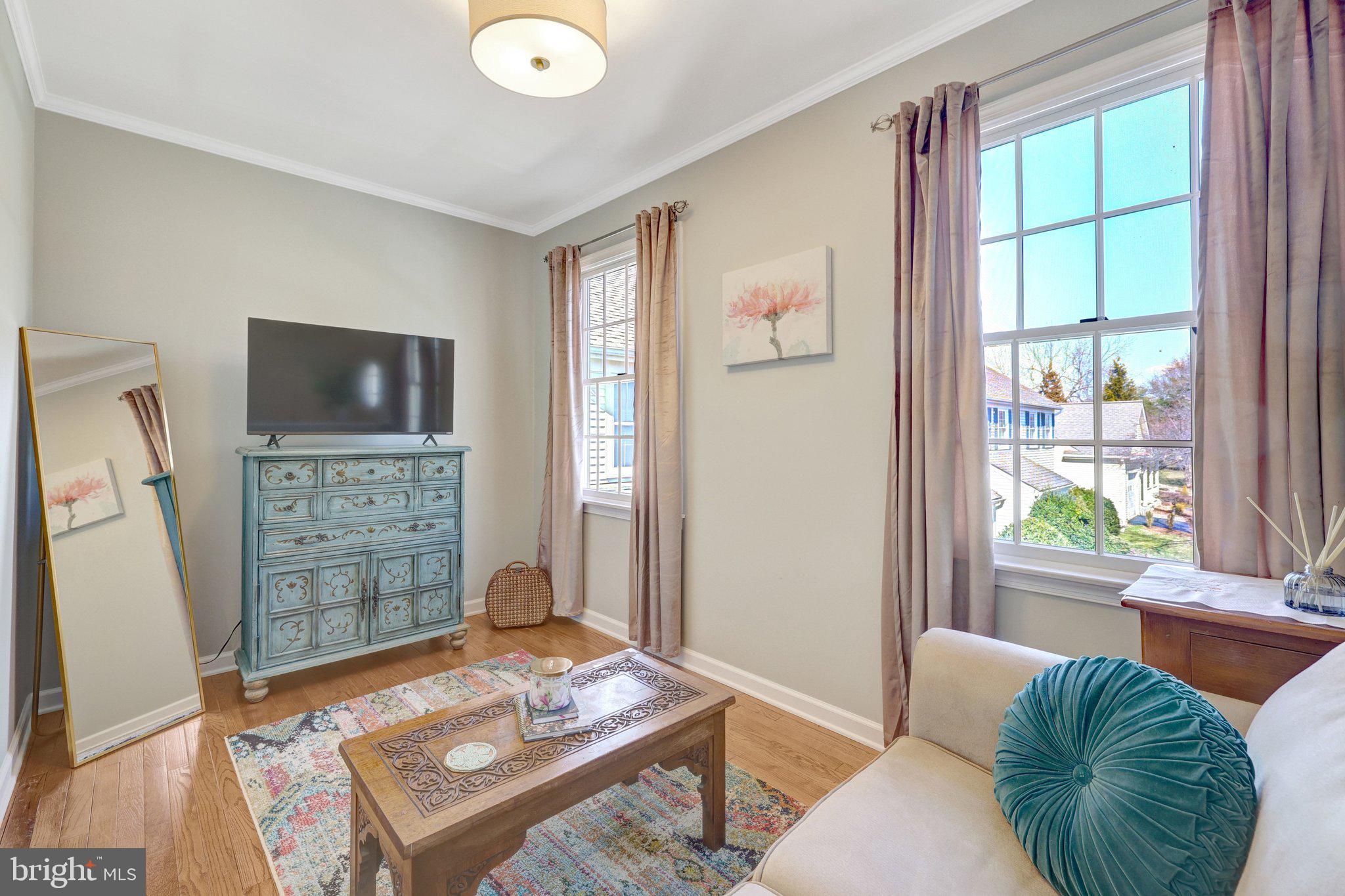 21039 Barcroft Way Sterling, VA 20164 - Photo 33 of 63 a living room with furniture and a window