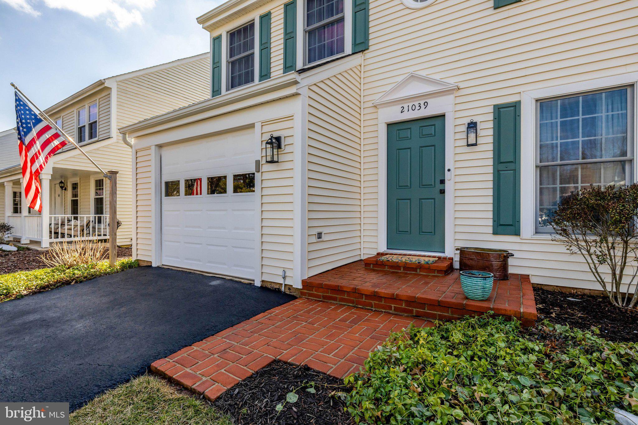 21039 Barcroft Way Sterling, VA 20164 - Photo 4 of 63 a backyard of a house with seating space