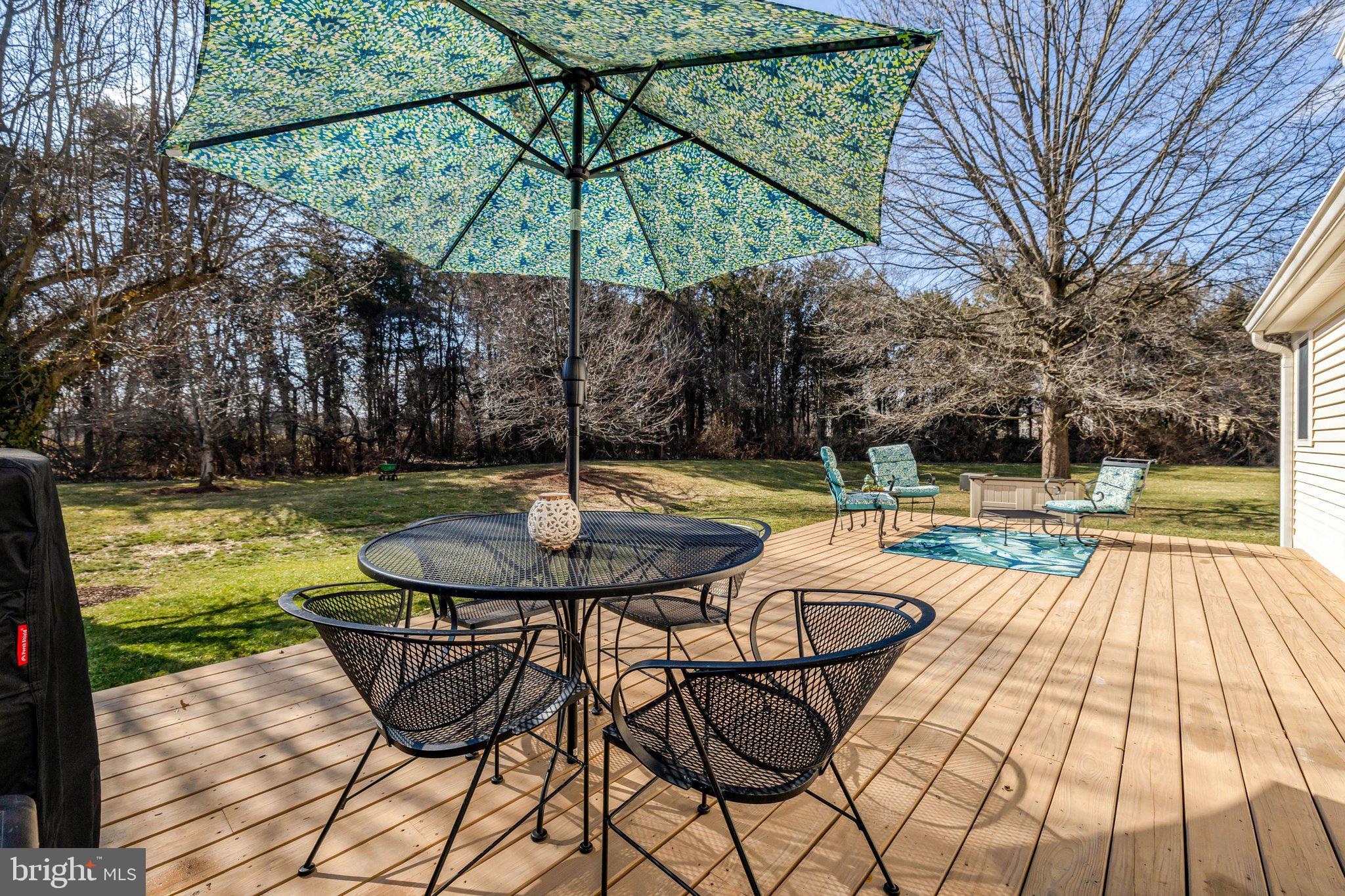 21039 Barcroft Way Sterling, VA 20164 - Photo 55 of 63 a view of a swimming pool with a patio