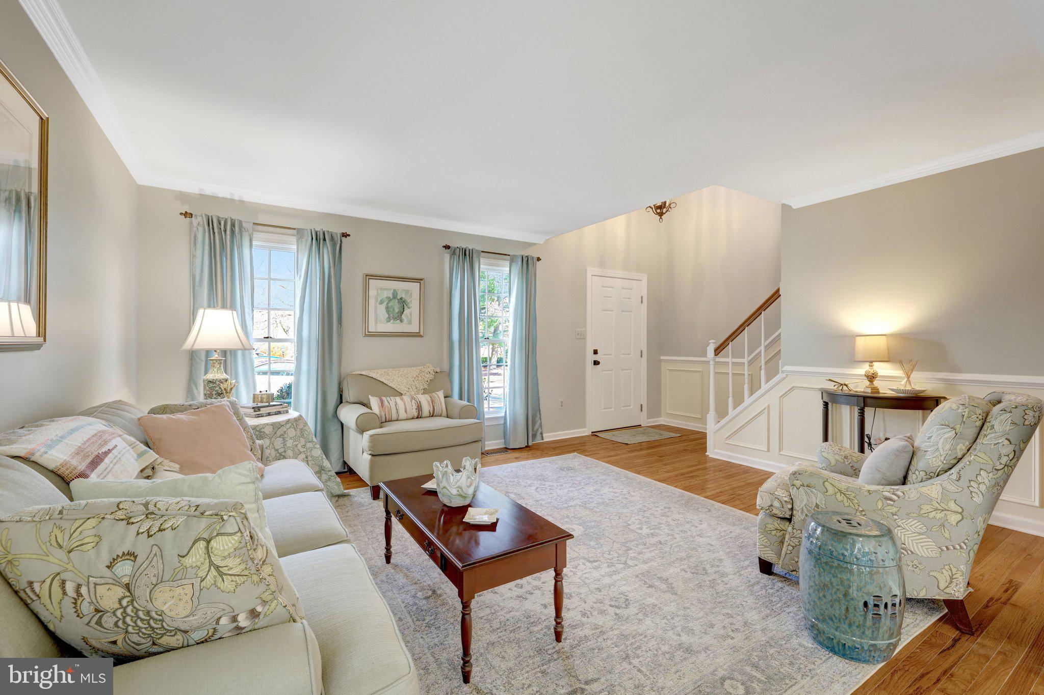 21039 Barcroft Way Sterling, VA 20164 - Photo 9 of 63 a living room with furniture and wooden floor