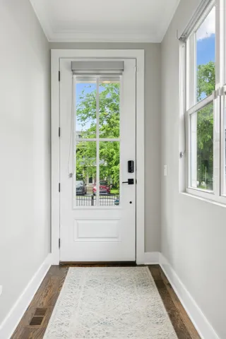 a view of an empty room with a window