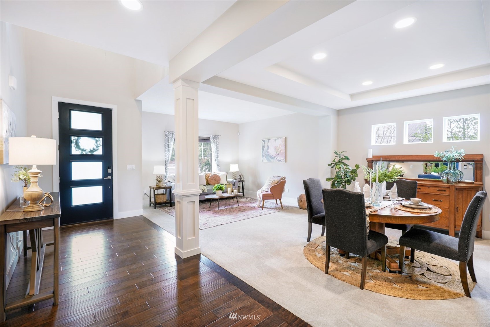 23107 19th Place West Bothell, WA 98021 - Photo 5 of 39 a view of a dining room with furniture and wooden floor