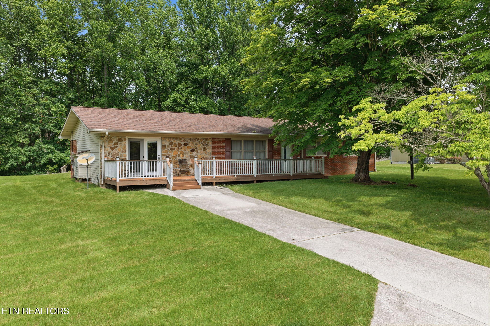 815 Stephens Road Rocky Top, TN 37769 - Photo 2 of 33 49-web-or-mls-DJI_20260529134643_0425_D