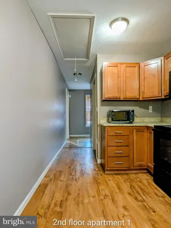 a bedroom with a bed and a fireplace
