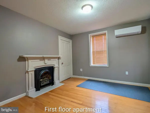 a view of a livingroom with furniture and window