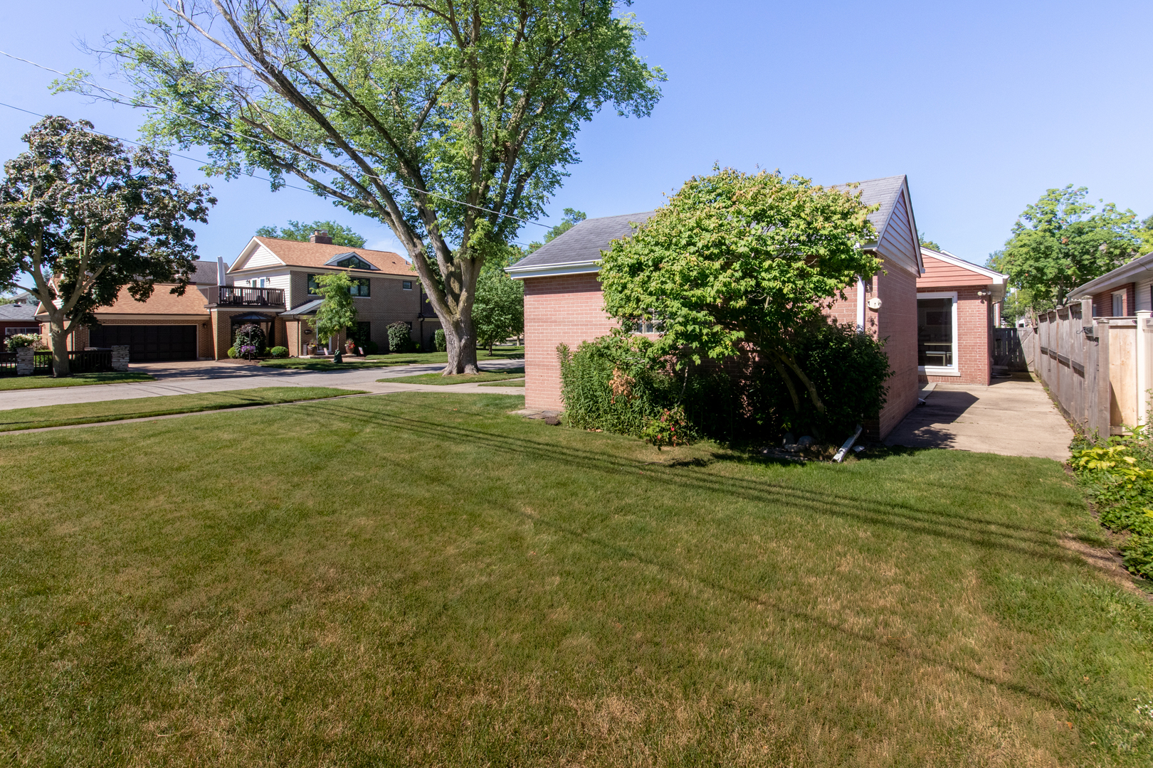 2020 Cherry Street Park Ridge, IL 60068 - Photo 23 of 23 a front view of a house with a garden