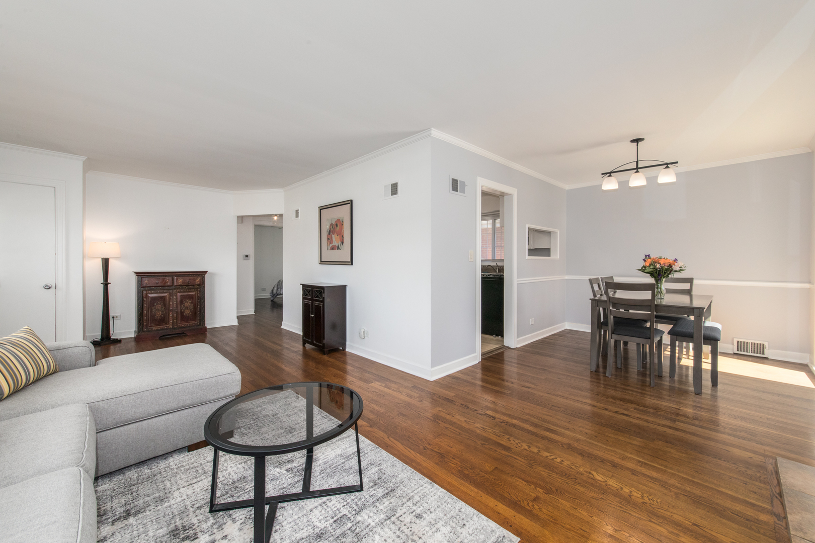 2020 Cherry Street Park Ridge, IL 60068 - Photo 6 of 23 a living room with furniture and a wooden floor