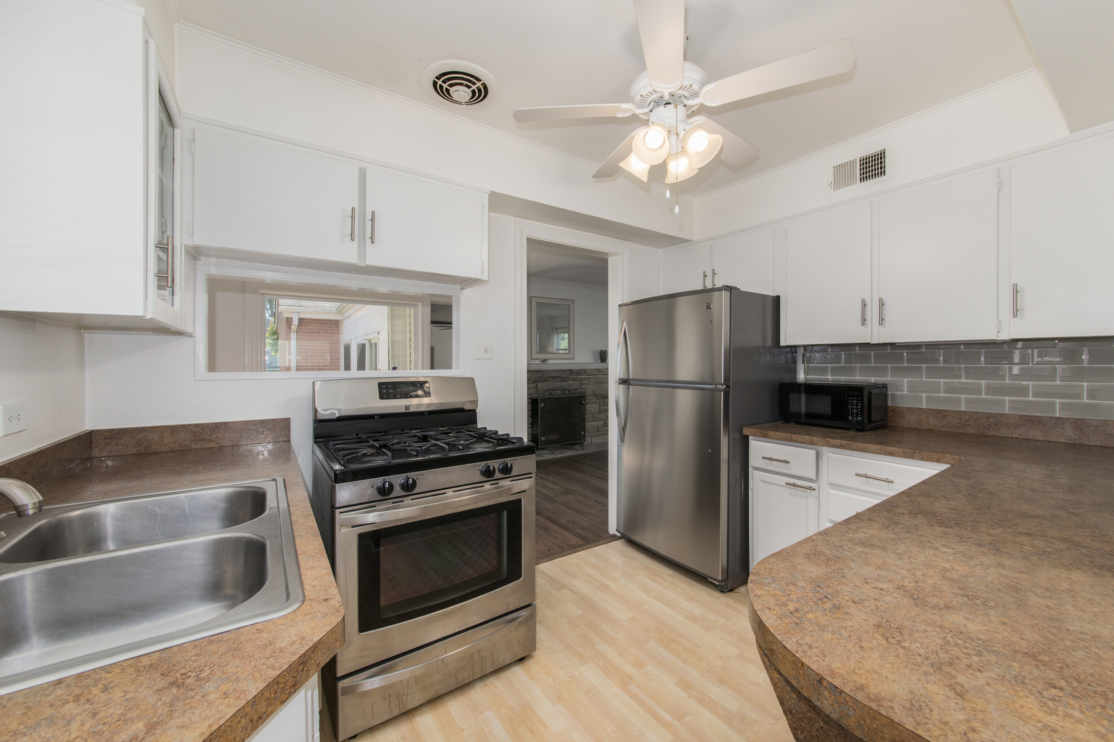 2020 Cherry Street Park Ridge, IL 60068 - Photo 9 of 23 a kitchen with a stove a refrigerator and a sink