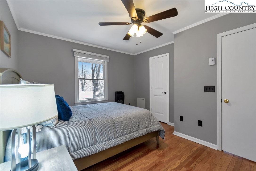 119 Overbrook Trail Beech Mountain, NC 28604 - Photo 16 of 27 a bedroom with a bed and a window