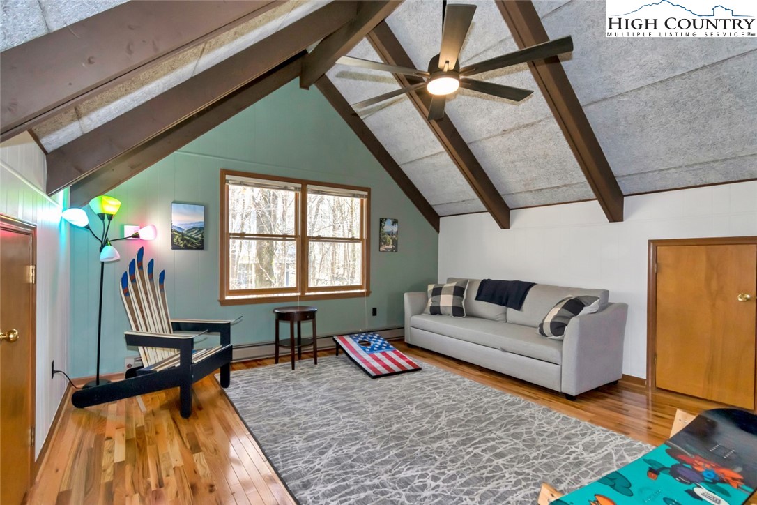119 Overbrook Trail Beech Mountain, NC 28604 - Photo 19 of 27 a living room with furniture and a rug