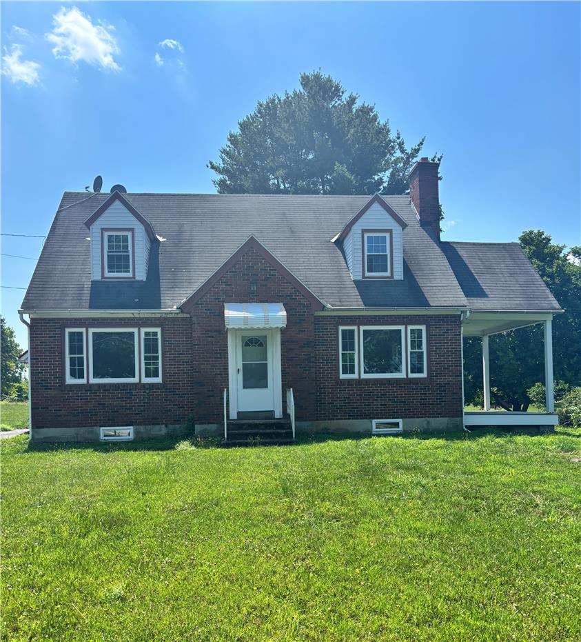 848 Hausman Road Allentown, PA 18104 - Photo 1 of 11 A charming brick exterior with dormer windows and an inviting front porch.