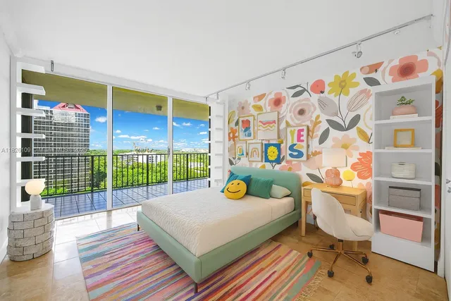 a bedroom with a bed and a wooden floor