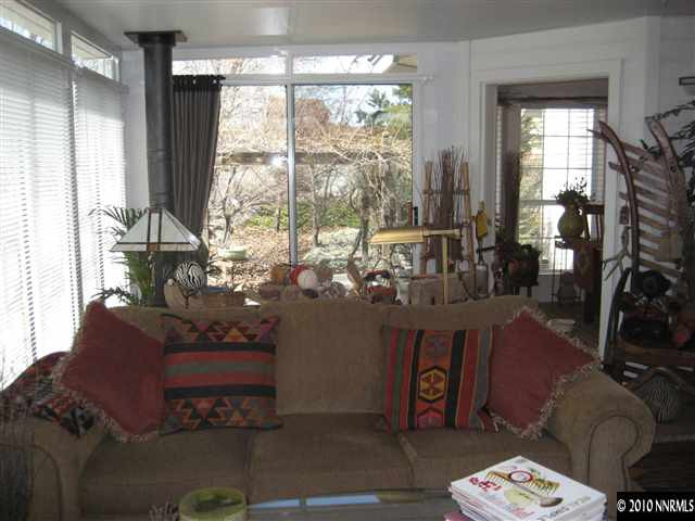 30 Targhee Court Reno, NV 89511 - Photo 5 of 9 a living room with furniture and a large window
