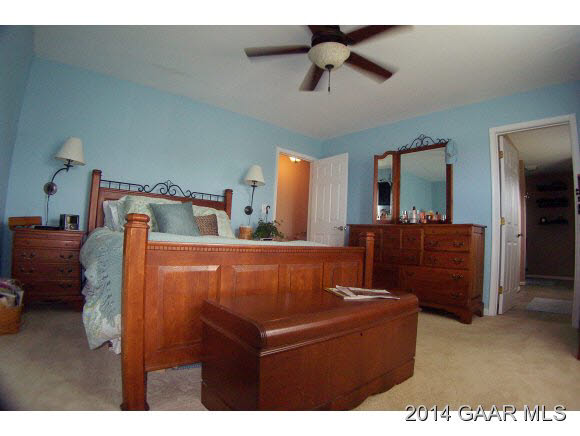3788 Shutterlee Mill Road Staunton, VA 24401 - Photo 16 of 32 a living room with furniture and a wooden floor