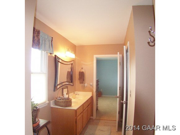 3788 Shutterlee Mill Road Staunton, VA 24401 - Photo 20 of 32 a bathroom with a sink and a mirror