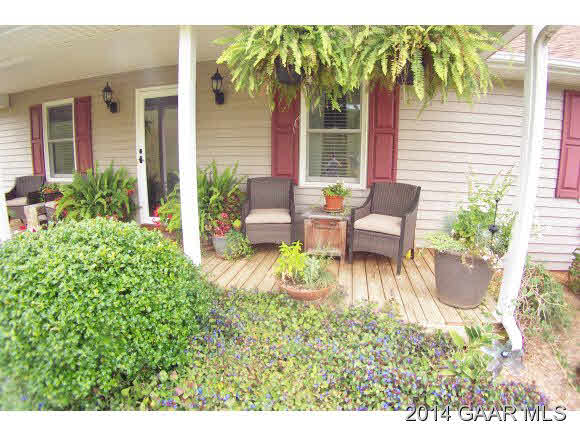 3788 Shutterlee Mill Road Staunton, VA 24401 - Photo 4 of 32 a view of a house with patio and a yard