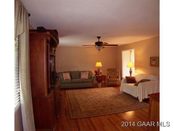 3788 Shutterlee Mill Road Staunton, VA 24401 - Photo 6 of 32 a living room with furniture and a ceiling fan